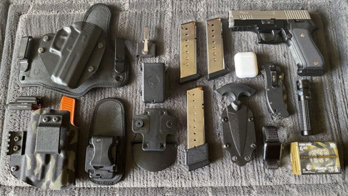 What I'm Carrying Now: A P220 and a ZT O350 - The Truth About Guns